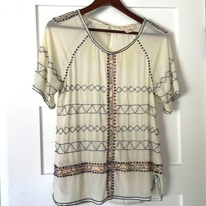 Blouse with embellishments